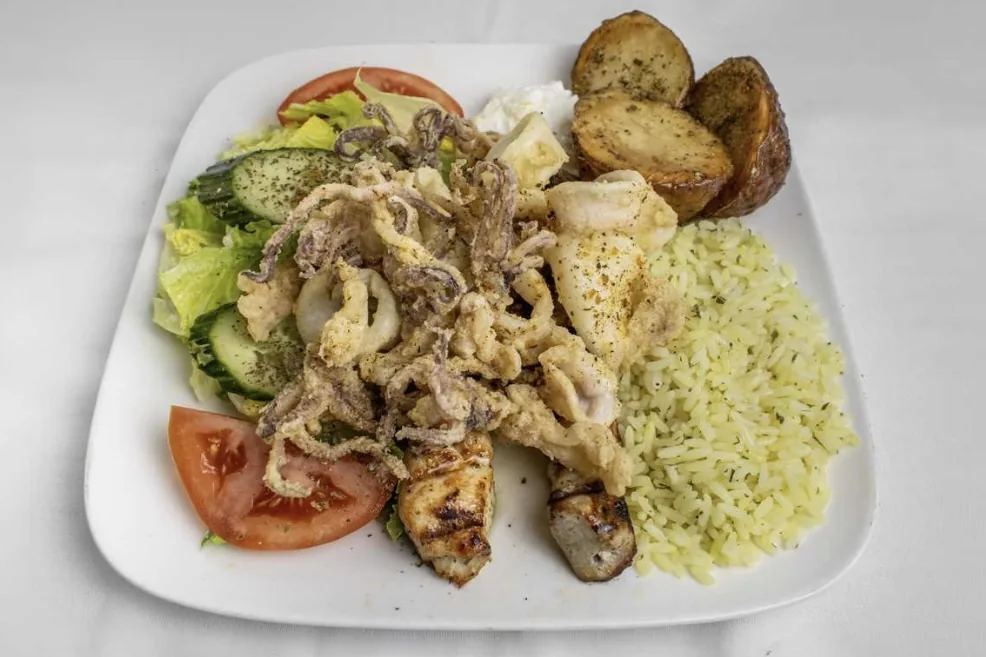 Souvlaki Calamari Combo: souvlaki, calamari, rice, salad and potatoes